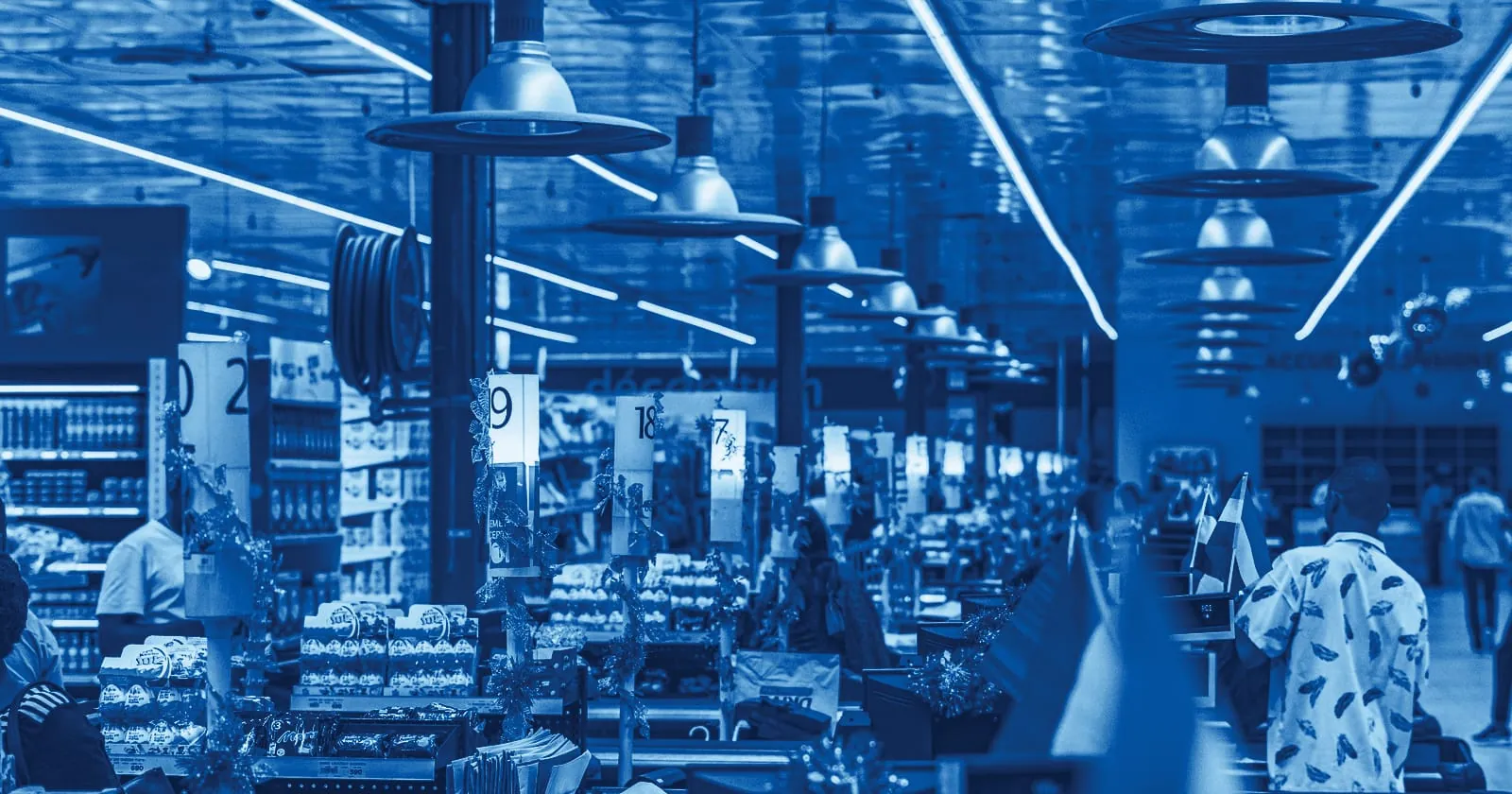 A long row of busy supermarket checkouts
