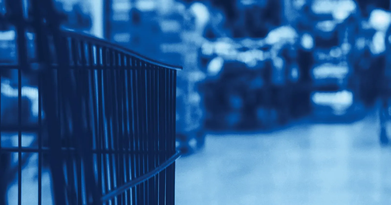 A shopping trolley in a supermarket aisle